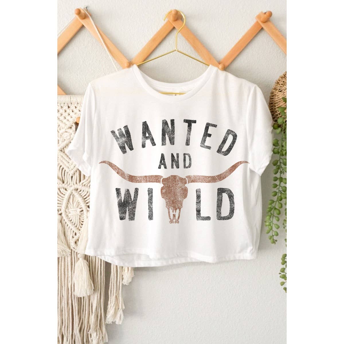 WANTED AND WILD GRAPHIC CROP TOP